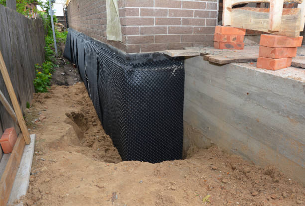 SJ Waterproofing Pros technician performing targeted Waterproofing assessment in Selma, NC